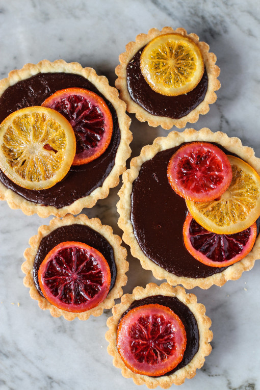 bittersweet chocolate tarts with candied oranges www.girlontherange.com