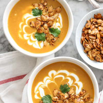 roasted pumpkin soup with spicy toasted pumpkin seeds and yogurt