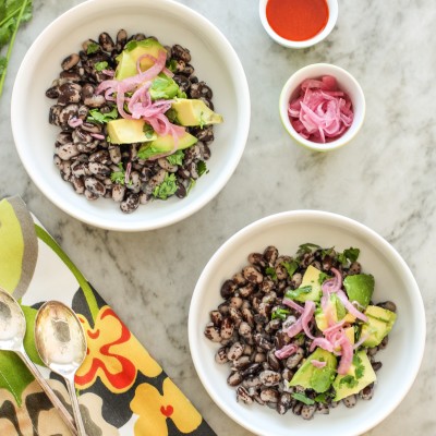 orca beans with avocado, cilantro, and pickled red onions