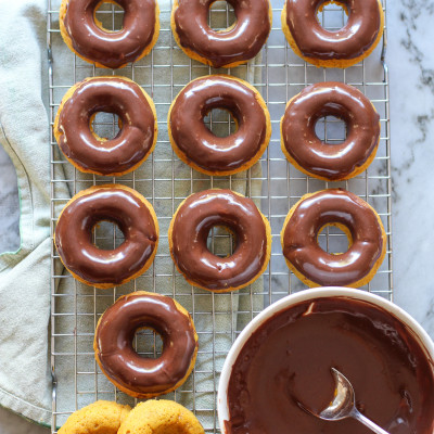 baked pumpkin donuts with chocolate glaze