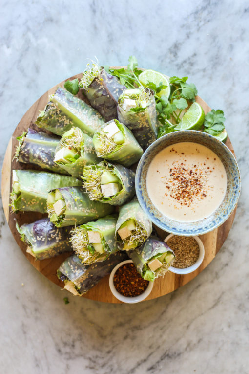 green summer rolls with spicy tahini sauce