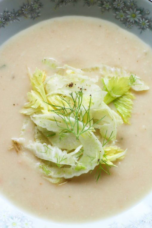 white bean soup with shaved fennel and celery leaf salad