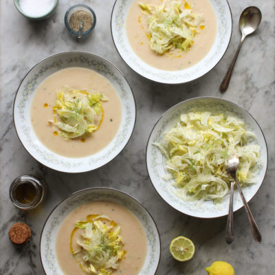 white bean soup with shaved fennel and celery leaf salad