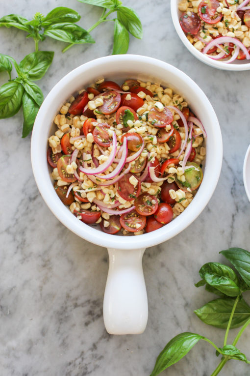 summer corn salad with cherry tomatoes and pickled red onion