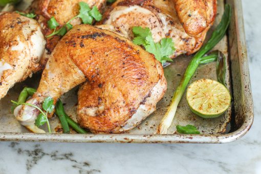 piri piri chicken with charred green onions and lime