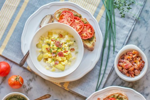 sweet corn chowder with fingerling potatoes and crispy bacon